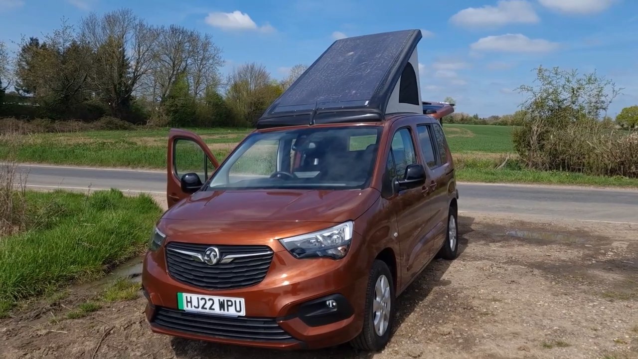 The Vikenze III-e with the roof raised, showing the solar panel at its optimum angle