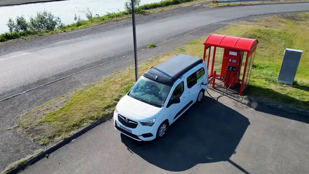 Topping up at one of Iceland’s chargers, the solar panel visible on the roof