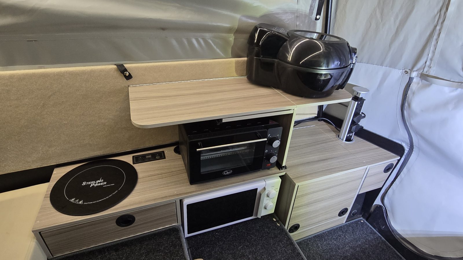 Kitchen induction hob and microwave