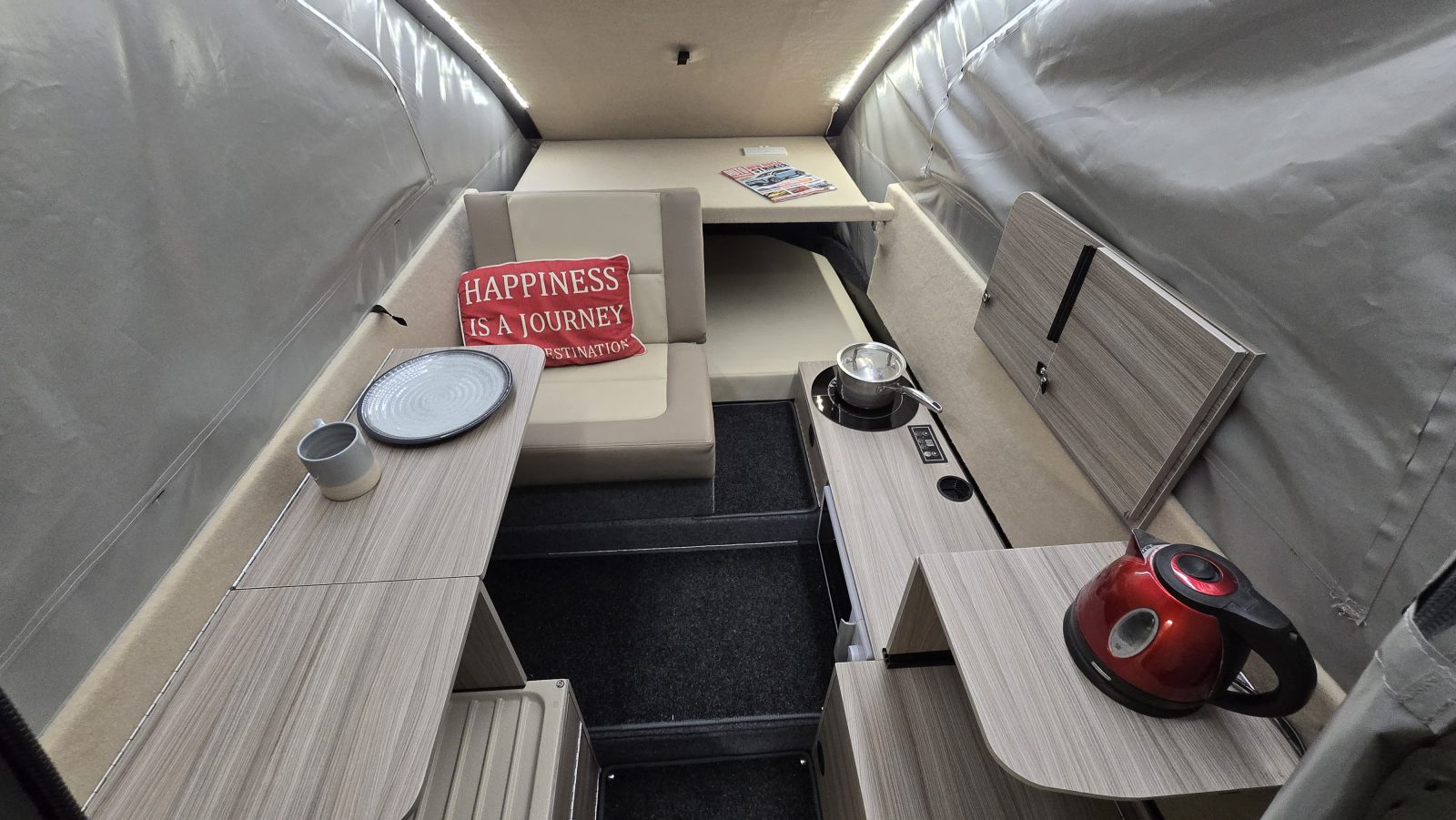 Interior with sofa and kitchen