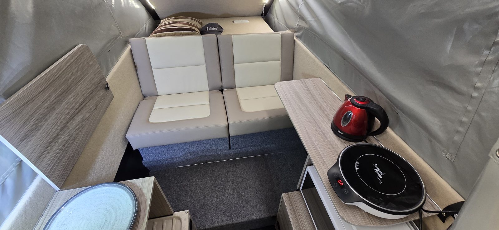 Interior with sofa and kitchen